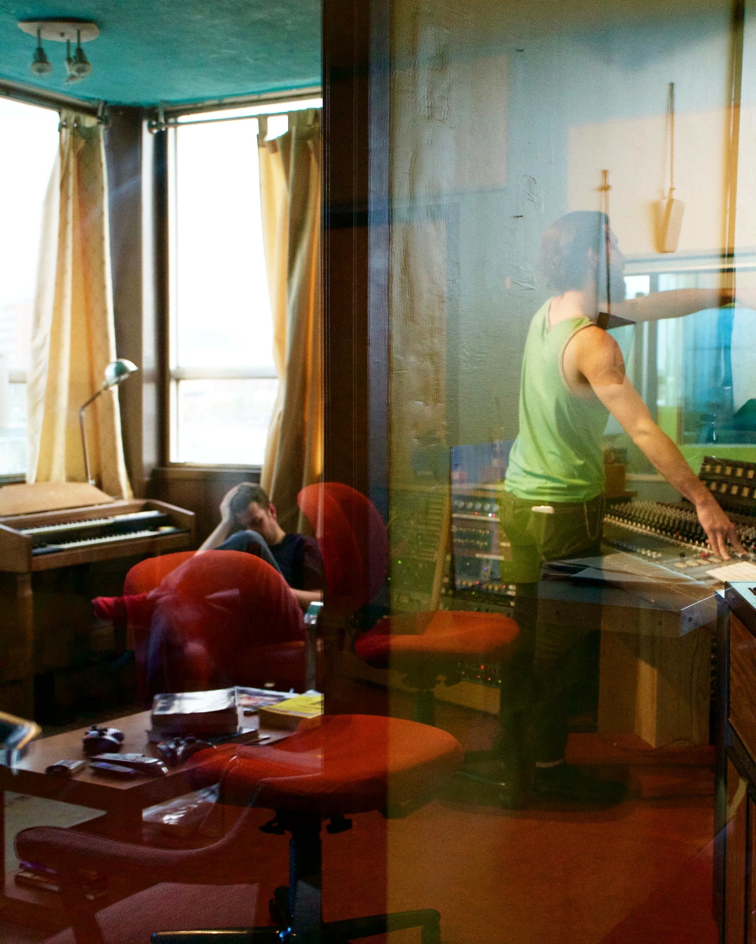 There is much room for play with photography. I find reflections a fun medium, here a photograph through a glass door mimics a double exposure.