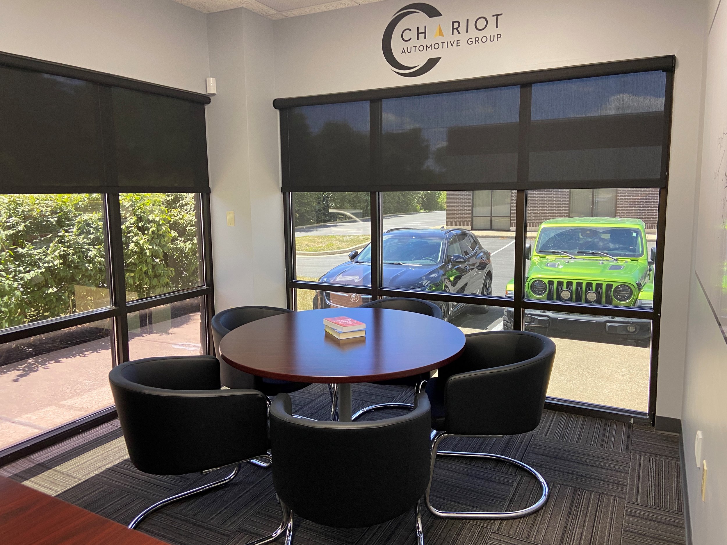  Hunter Douglas Designer Screen Shades in 1% opacity installed at Chariot Automotive Group 
