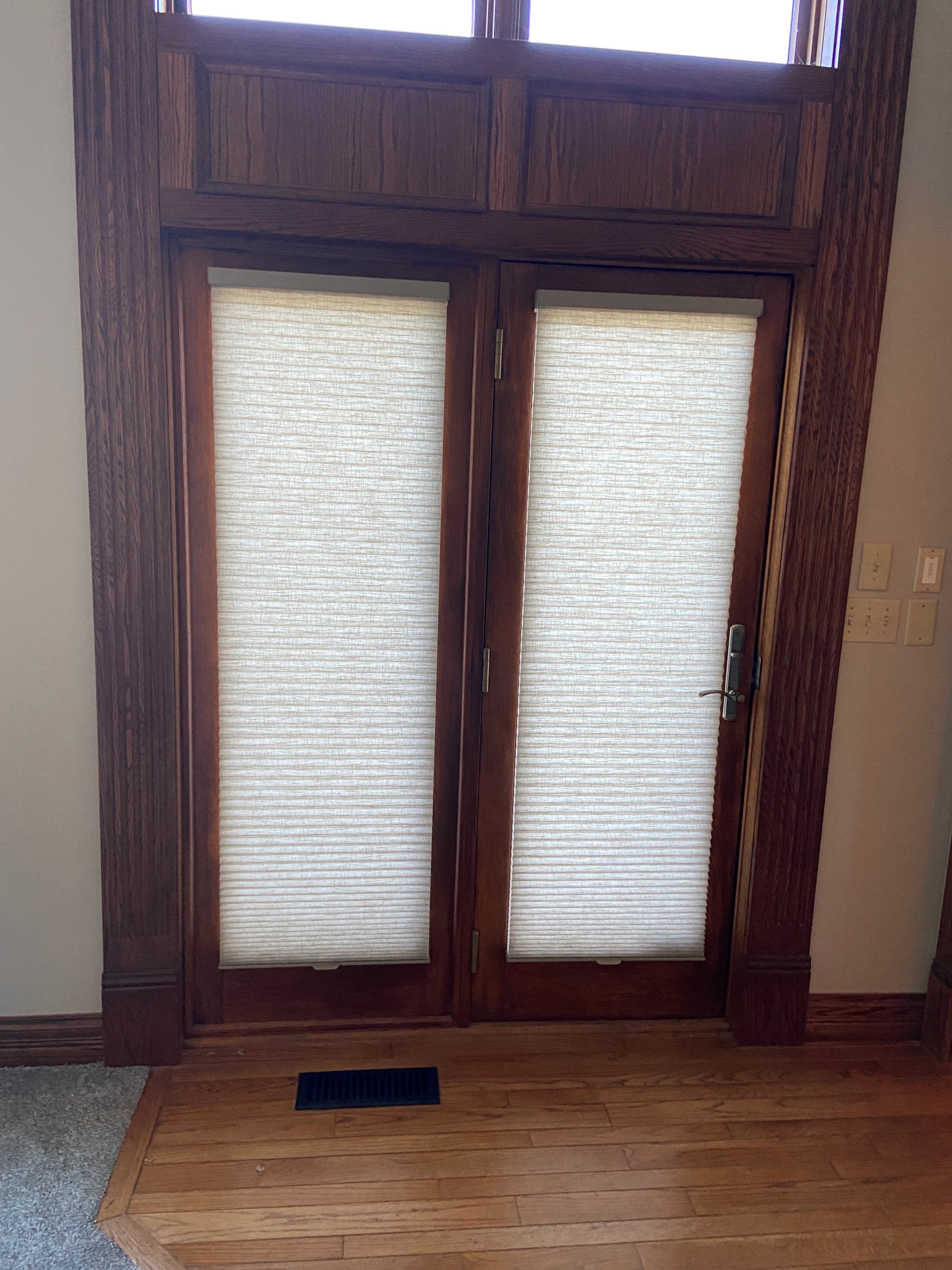  Hunter Douglas Duette® Honeycomb Shades in Alustra Leela Escape fabric make a great option for French Doors 
