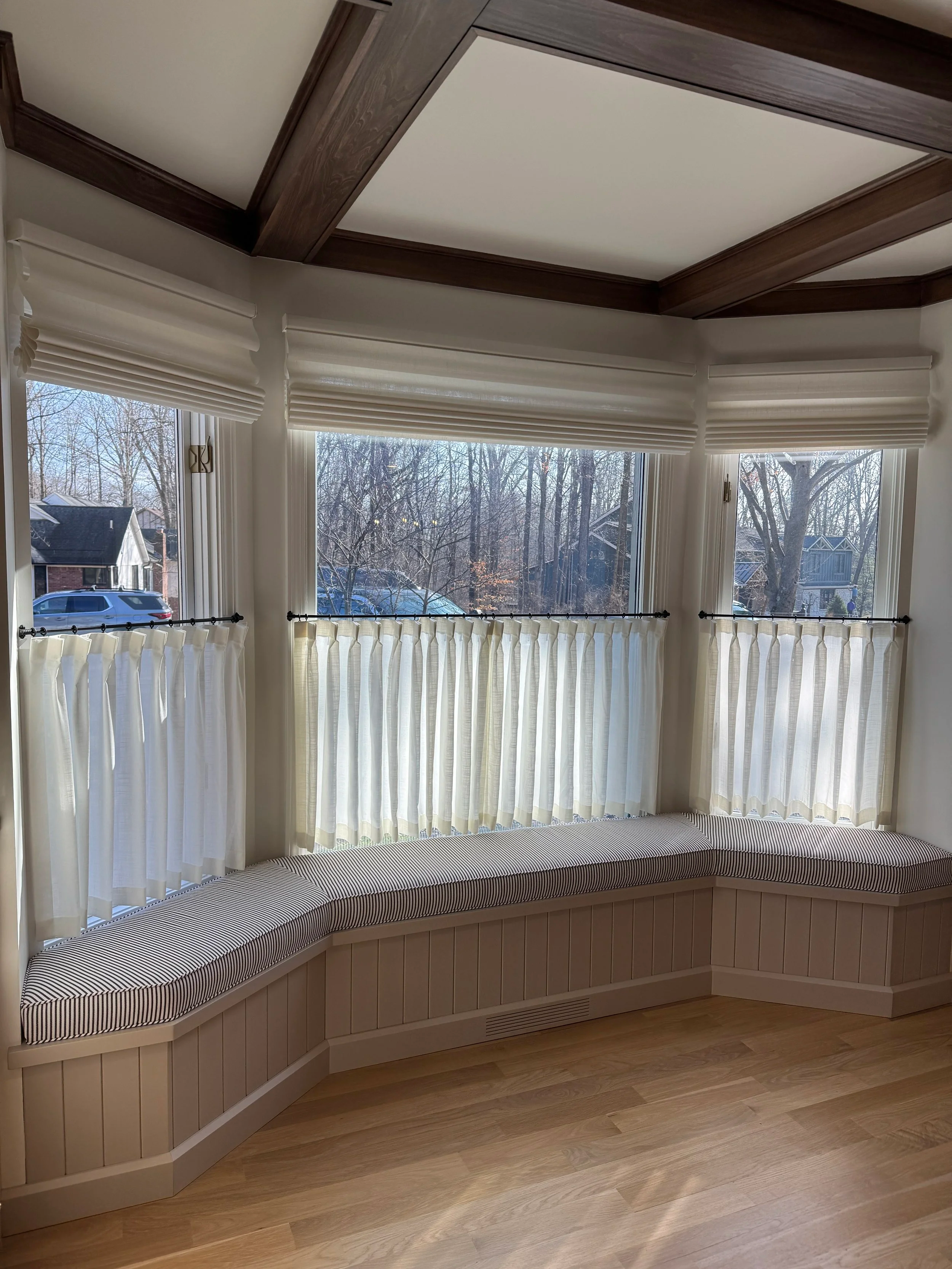  Custom sheer cafe curtains paired with Hunter Douglas Vignette Modern Roman Shades with PowerView Automation  