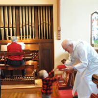 Bringing gifts to the altar
