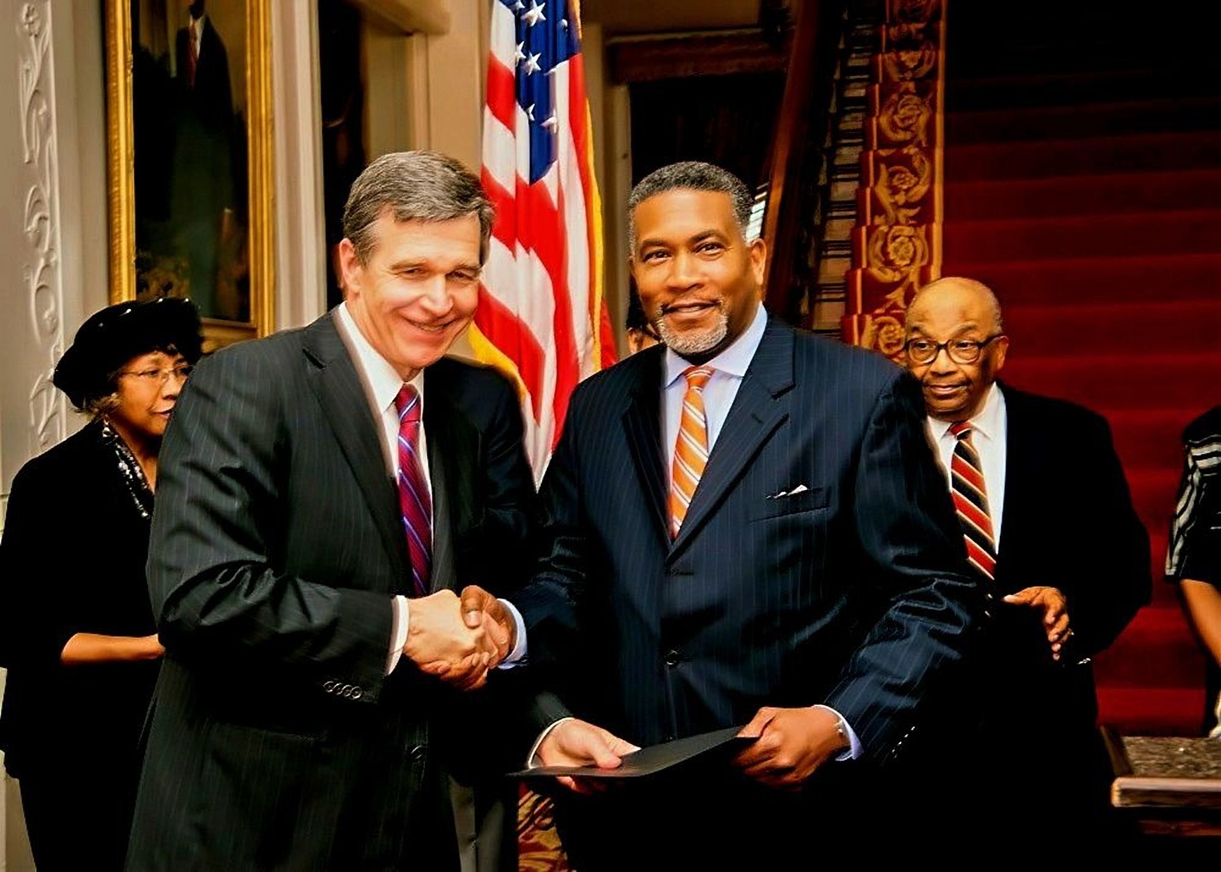 Receiving the Old North State Award from Governor Roy Cooper