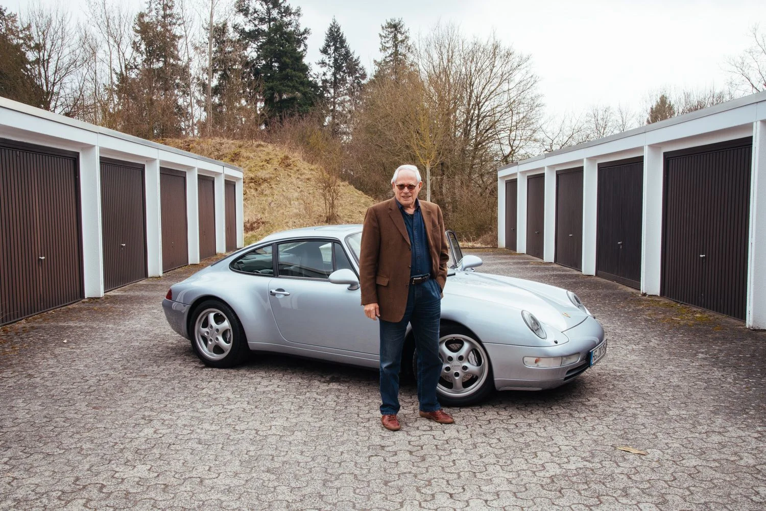 Dieter Rams and his silver Porsche 993, arguably the greatest sportscar ever.