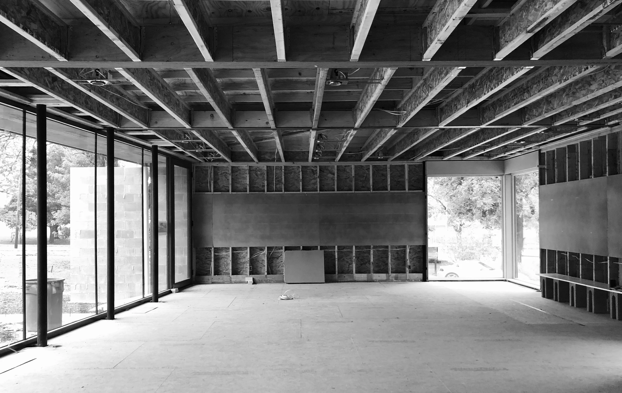 Future living room overlooking the courtyard and pool.