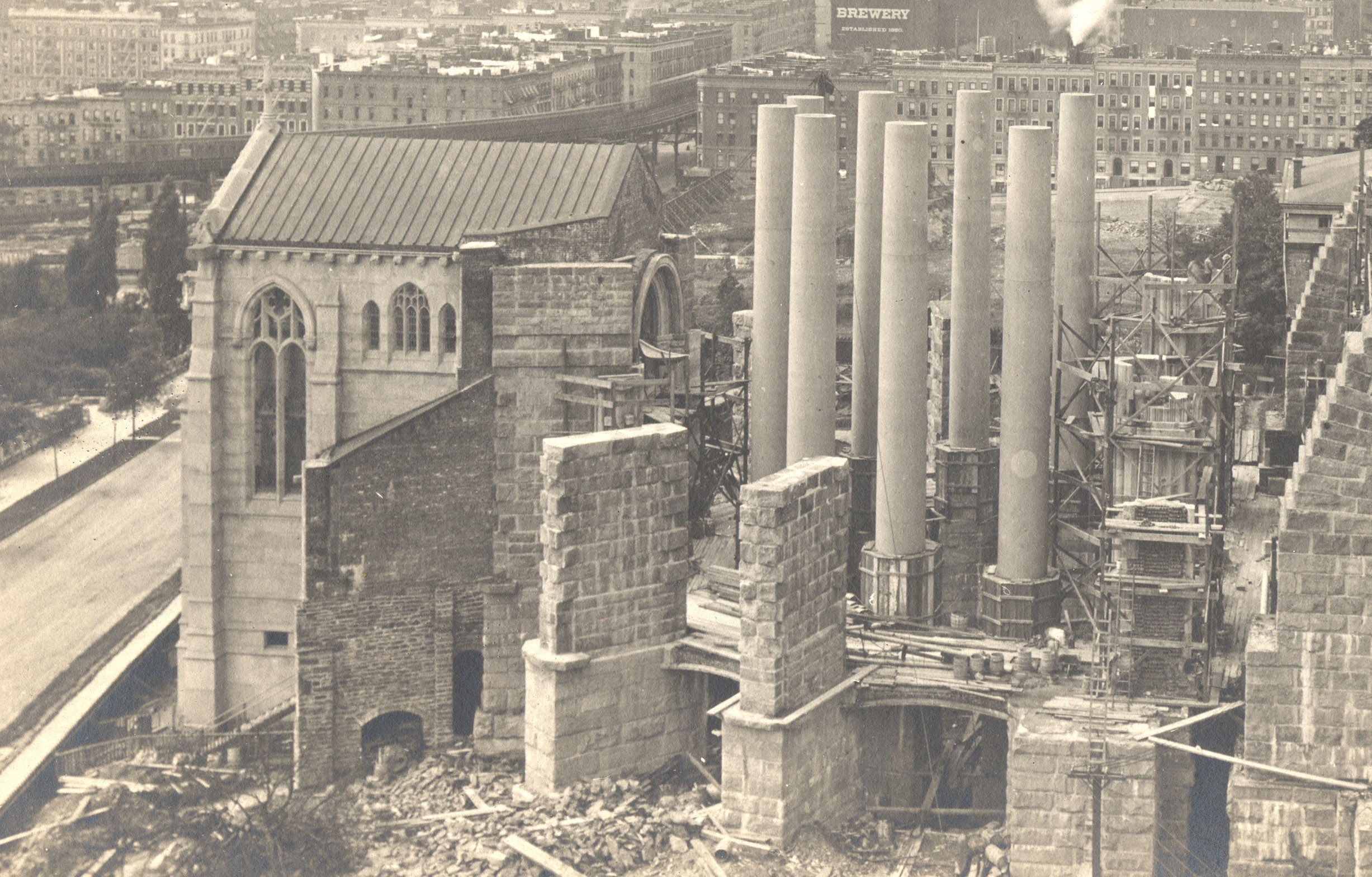  1905: Having spent most of their first decade building a gigantic foundation, thirteen years into construction the cathedral had only just erected the eight granite columns for the choir. They would cost $25,000 (today, $761,000) each. Credit: Episc