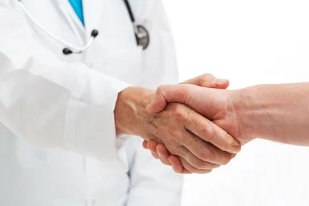 22218434_S_doctor_patient_shaking_hands.jpg