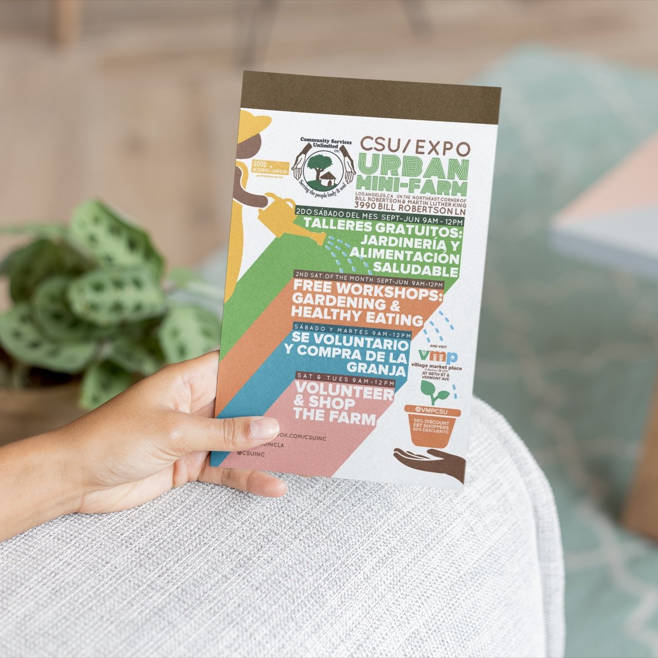 mockup-of-a-hand-holding-a-flyer-on-an-armchair-21857.jpeg