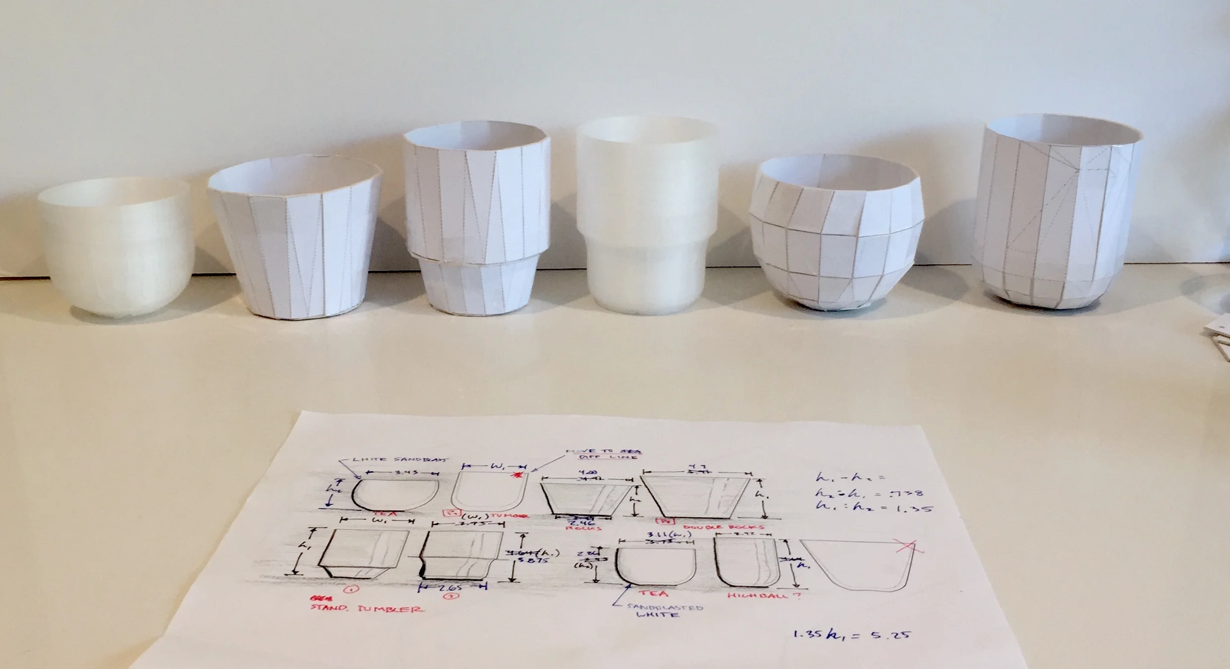 Full scale paper models of the group