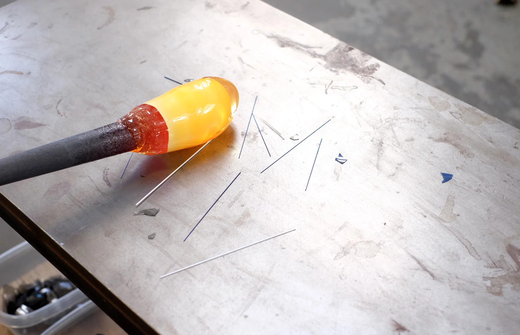 Picking up shards and strings onto a fresh gather