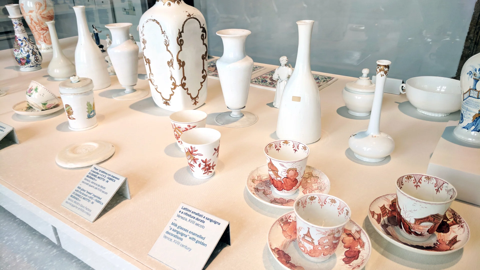 Opaque white "milk glass" tried to imitate the look of porcelain