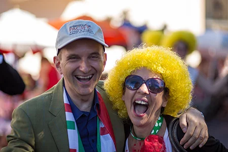 Italian Consul Dottor Mauro Battocchi clowns if up with Lua at the Italian Heritage Parade.