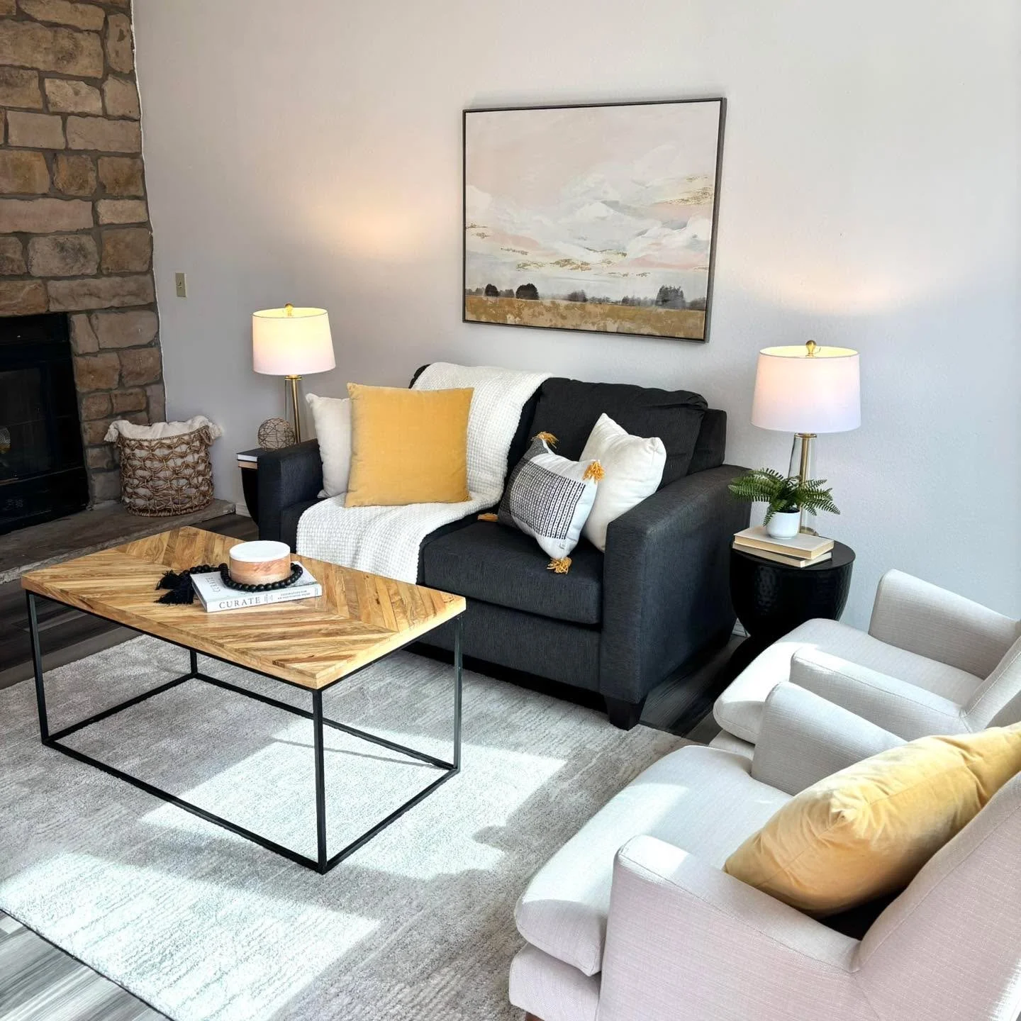A perfect sunny spot to sit and enjoy friends and family or cozy up with a book while the kids play outside! Either way, what a bright and airy living space! 

#5280magazine #acutedesigner #stagingworks #liveindenver #stagingsells #denverrealestate #