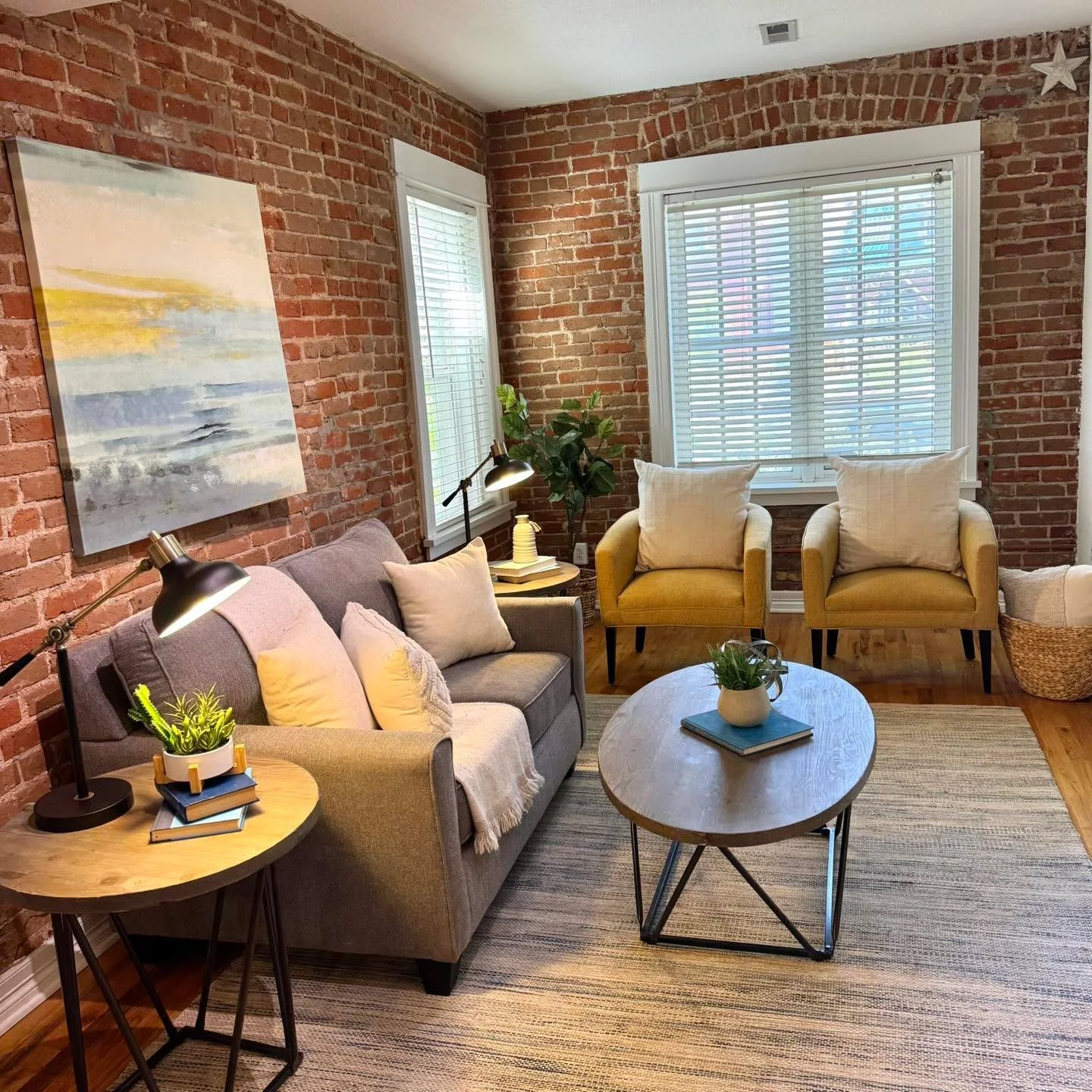 Warm textures, modern touches, and a layout that just flows ✨

This inviting living space blends exposed brick charm with clean, contemporary styling for the perfect balance of character and comfort. The open-concept design seamlessly connects the li