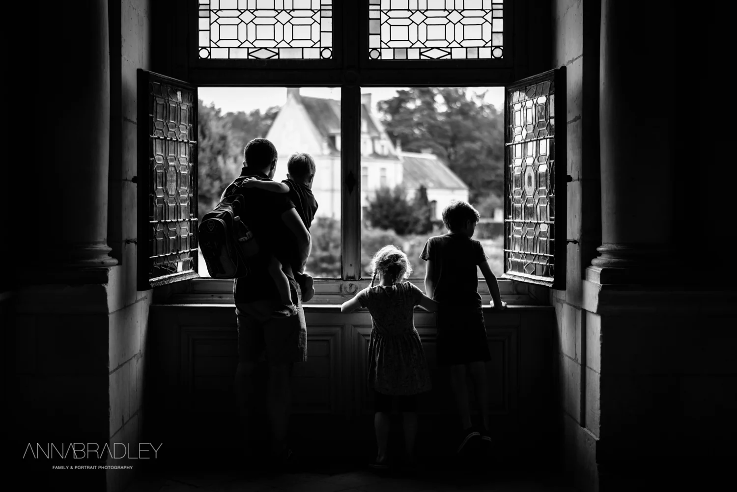 Family photo by the window - Anna Bradley photography.jpg