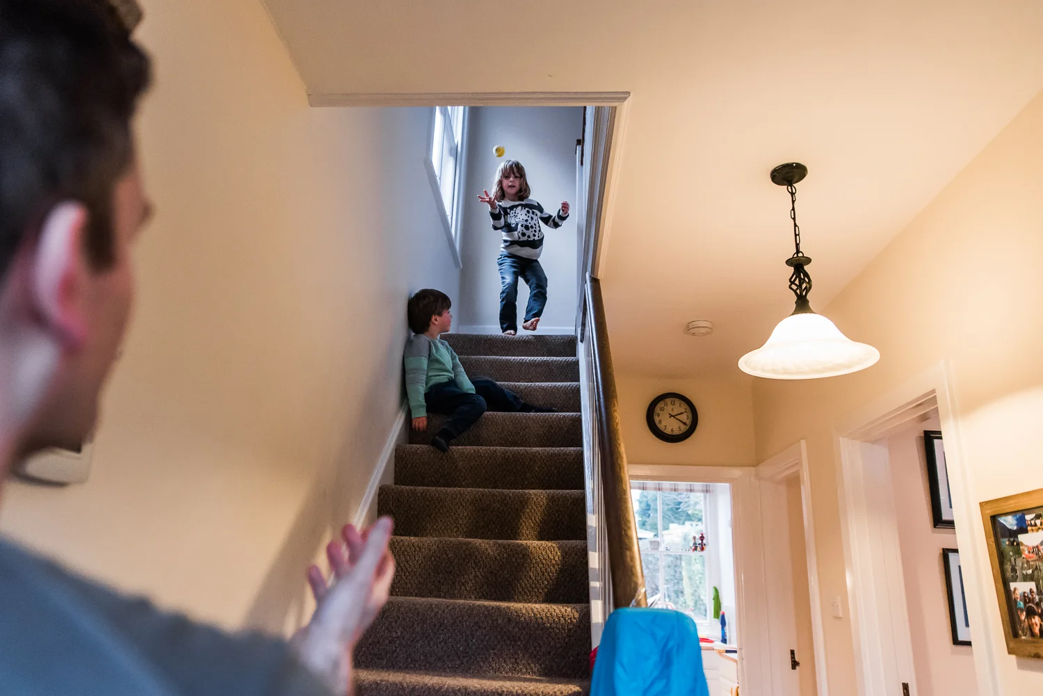 Copy of Playing ball on the stairs in day in the life photo session