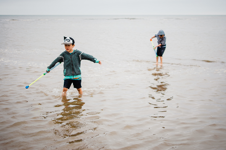 Children playing in the sea in North Norfolk