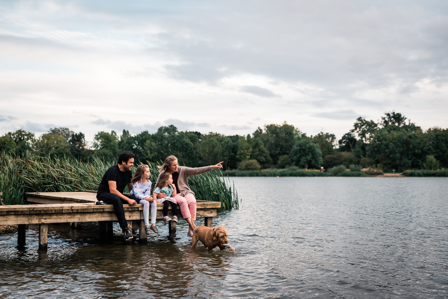 Natural family portrait by the a lake in Huntingdon