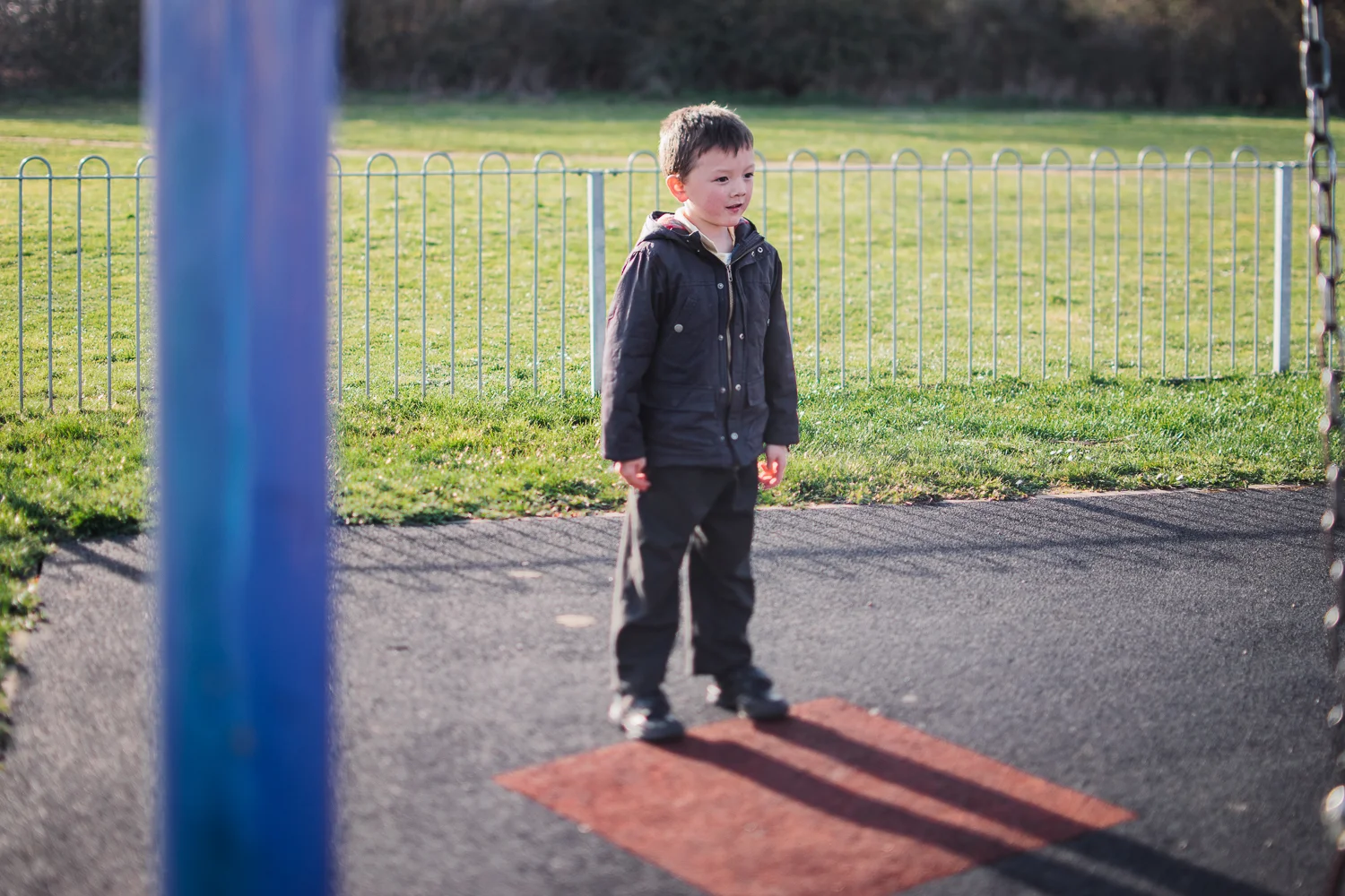 A boy in the park from a family photoshoot in Huntingdon.