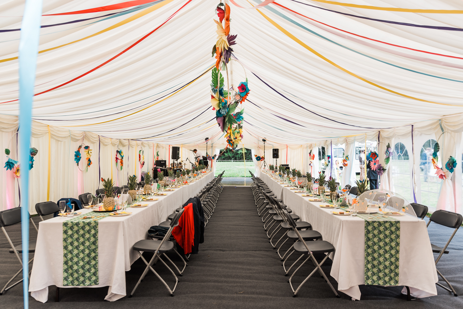 Wedding table setting inside a marquee tent in Cambridgeshire