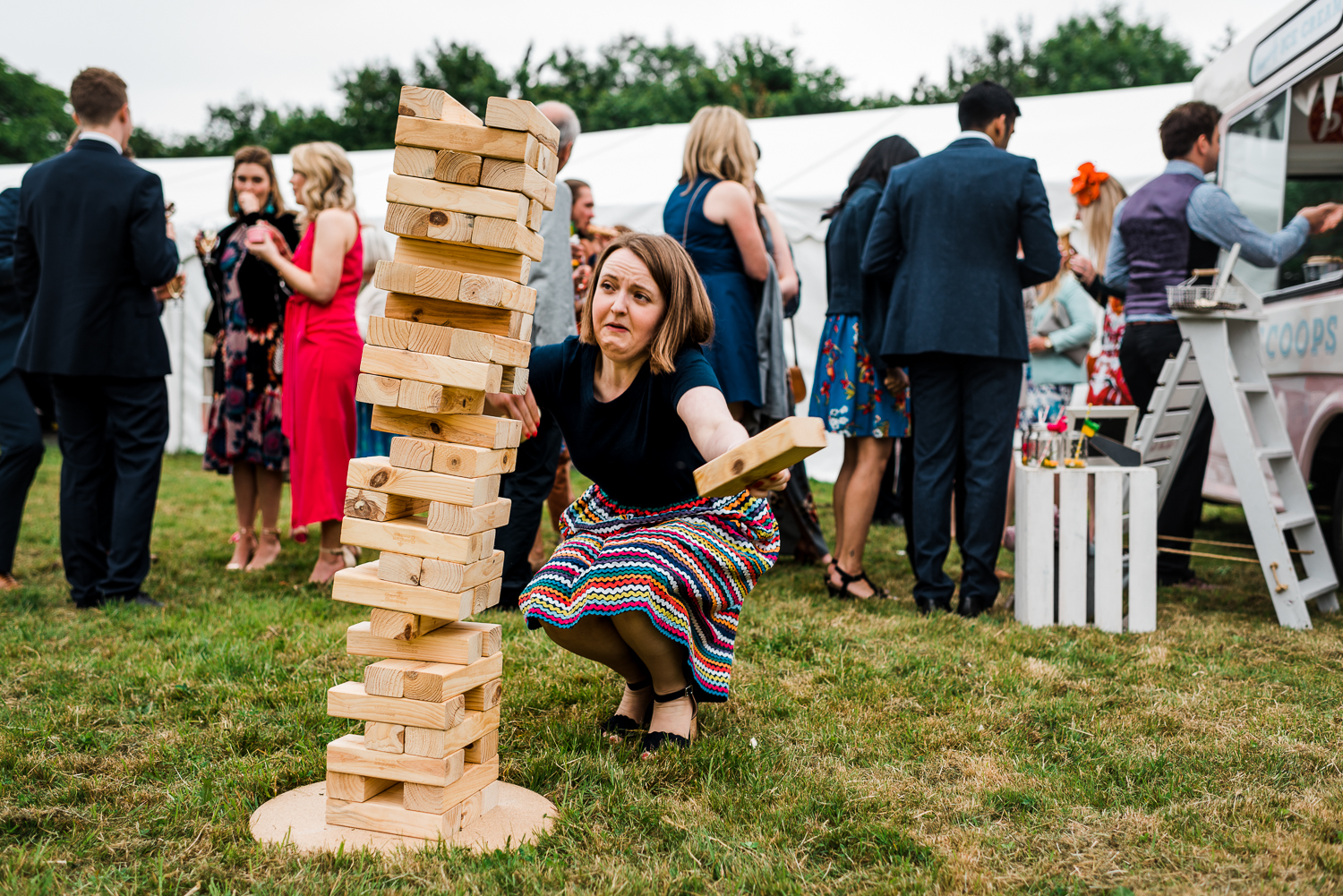 Garden games on the lawn at a festival-themed wedding