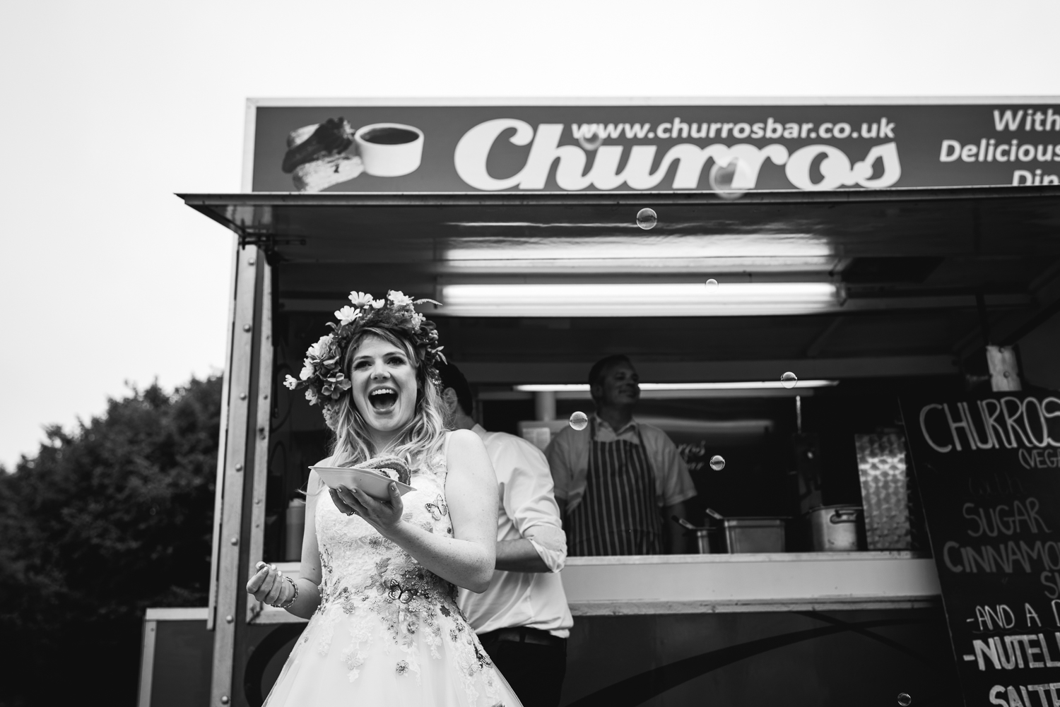 Bride with her churros from Churros Bar in Cambridge