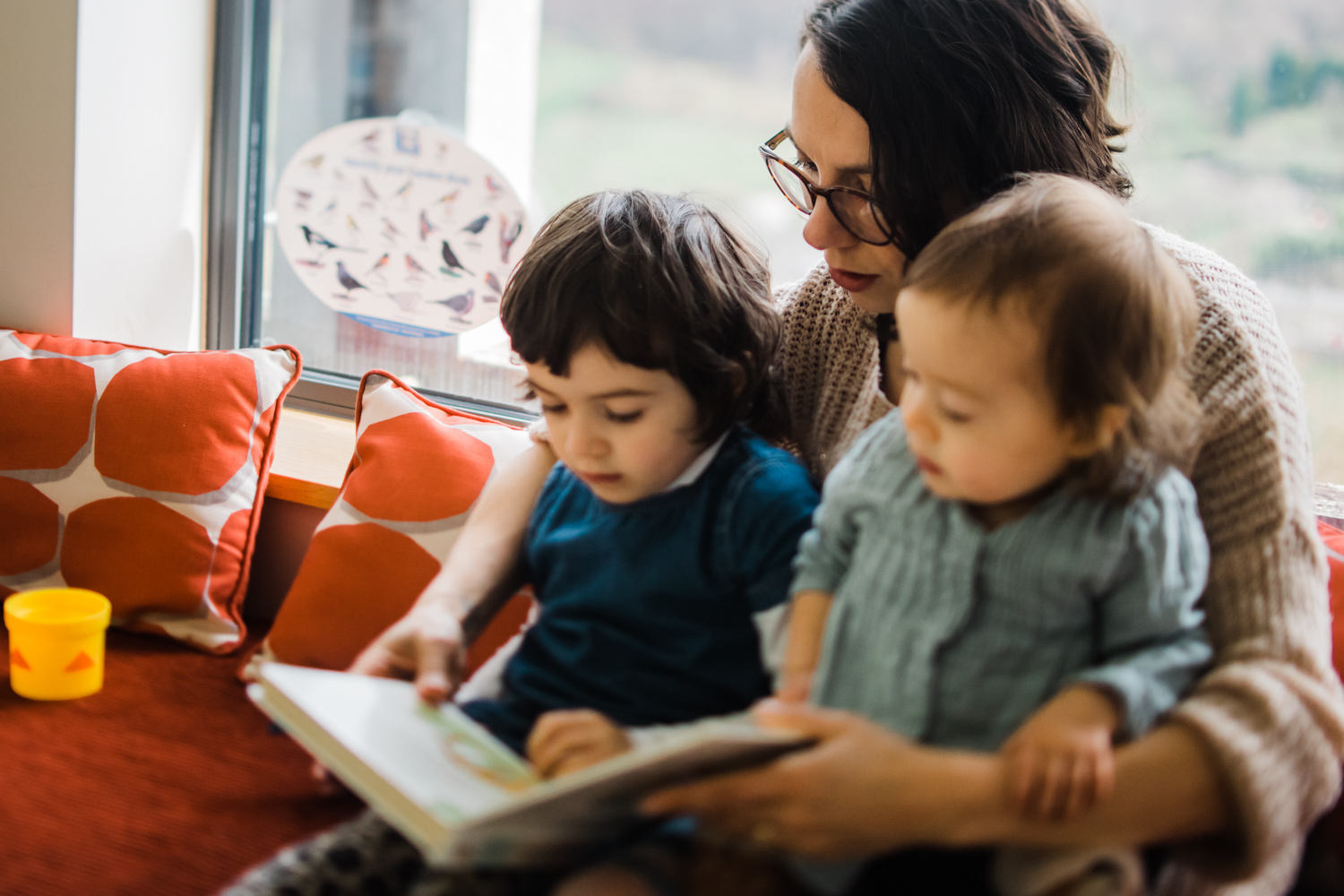 Copy of Freelensed photograph of a mother reading to her children