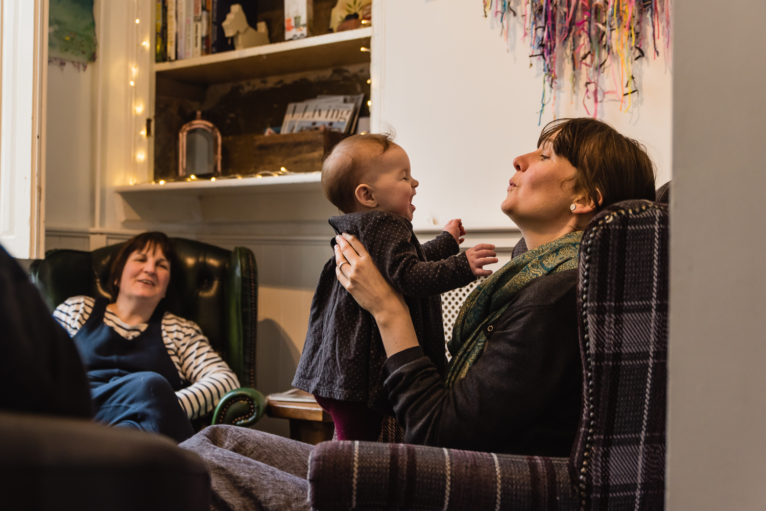 A lesbian couple and their baby taken by Diana Hagues Photograph