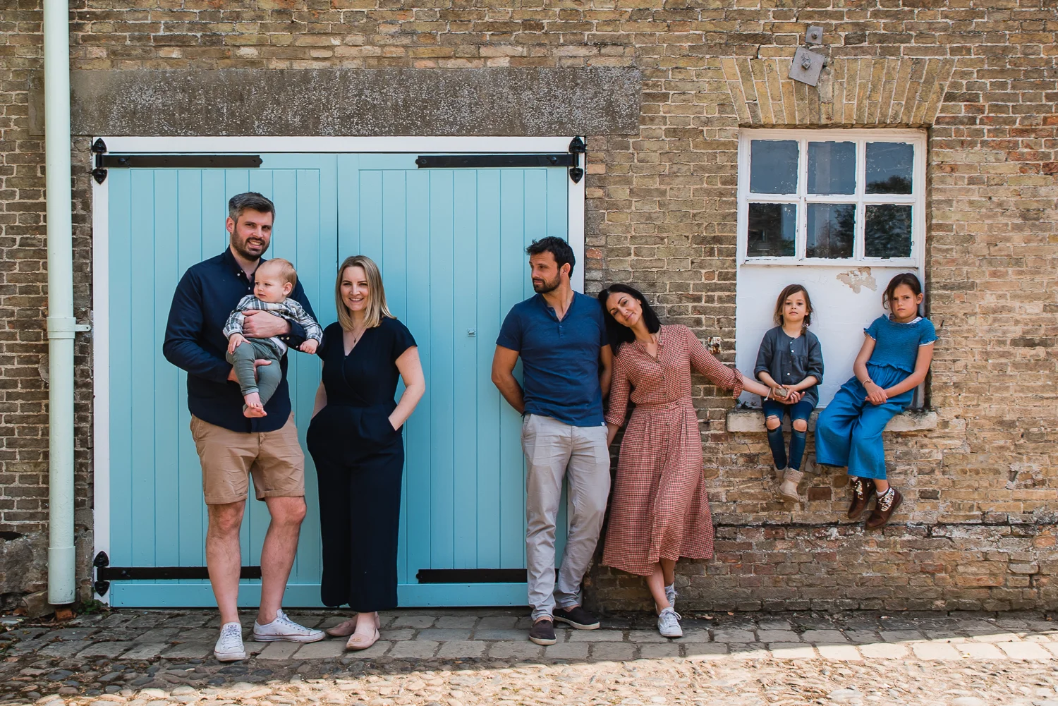 Relaxed family group photo at Wandlebury Country Park in Cambridge, Cambridgeshire
