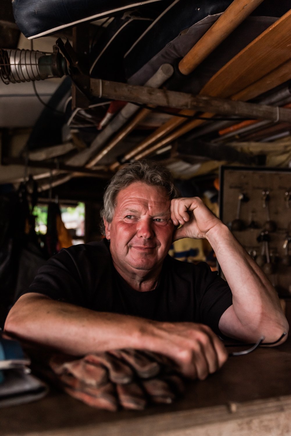  Environmental Portrait of a boatman in his workshop. 