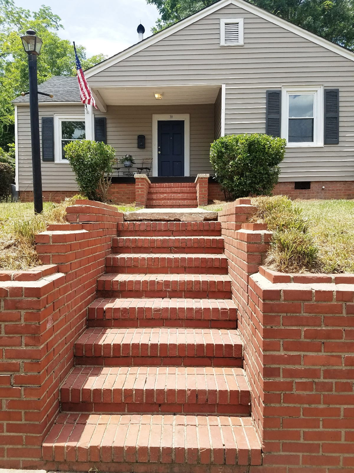 Haymount Homes Greenland Drive Front Steps brick wall.jpg