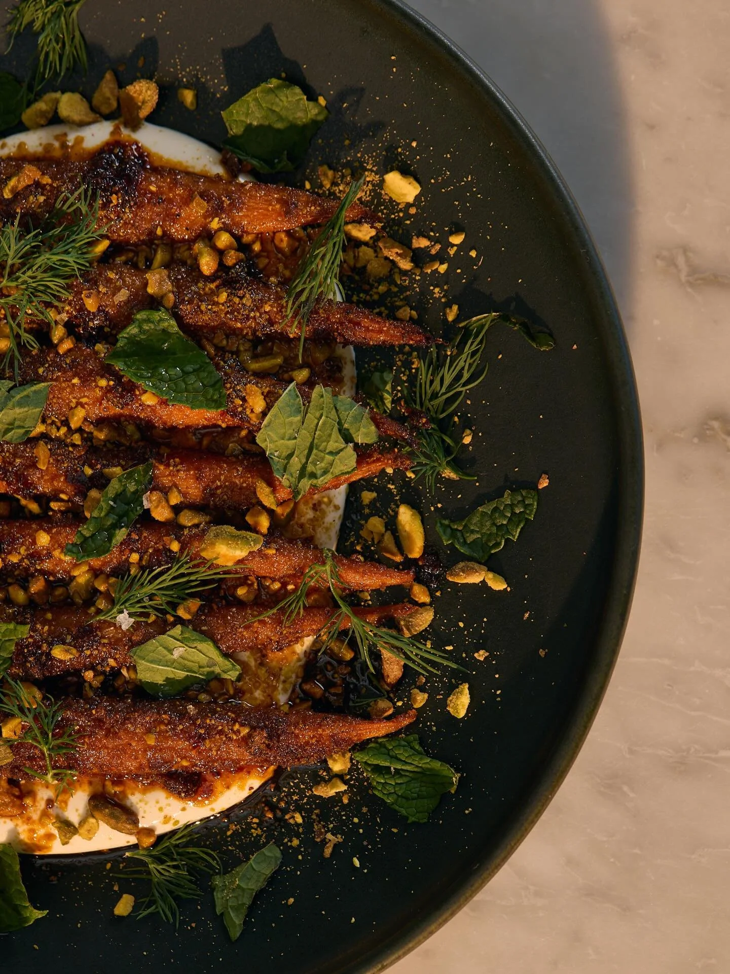 this season&rsquo;s roasted carrots (v+, gf) are a perfect addition to the table for any group down for sharing or order it for yourself. 

a house-made ras el hanout spice blend is dry rubbed on our carrots before roasting low-and-slow until tender,