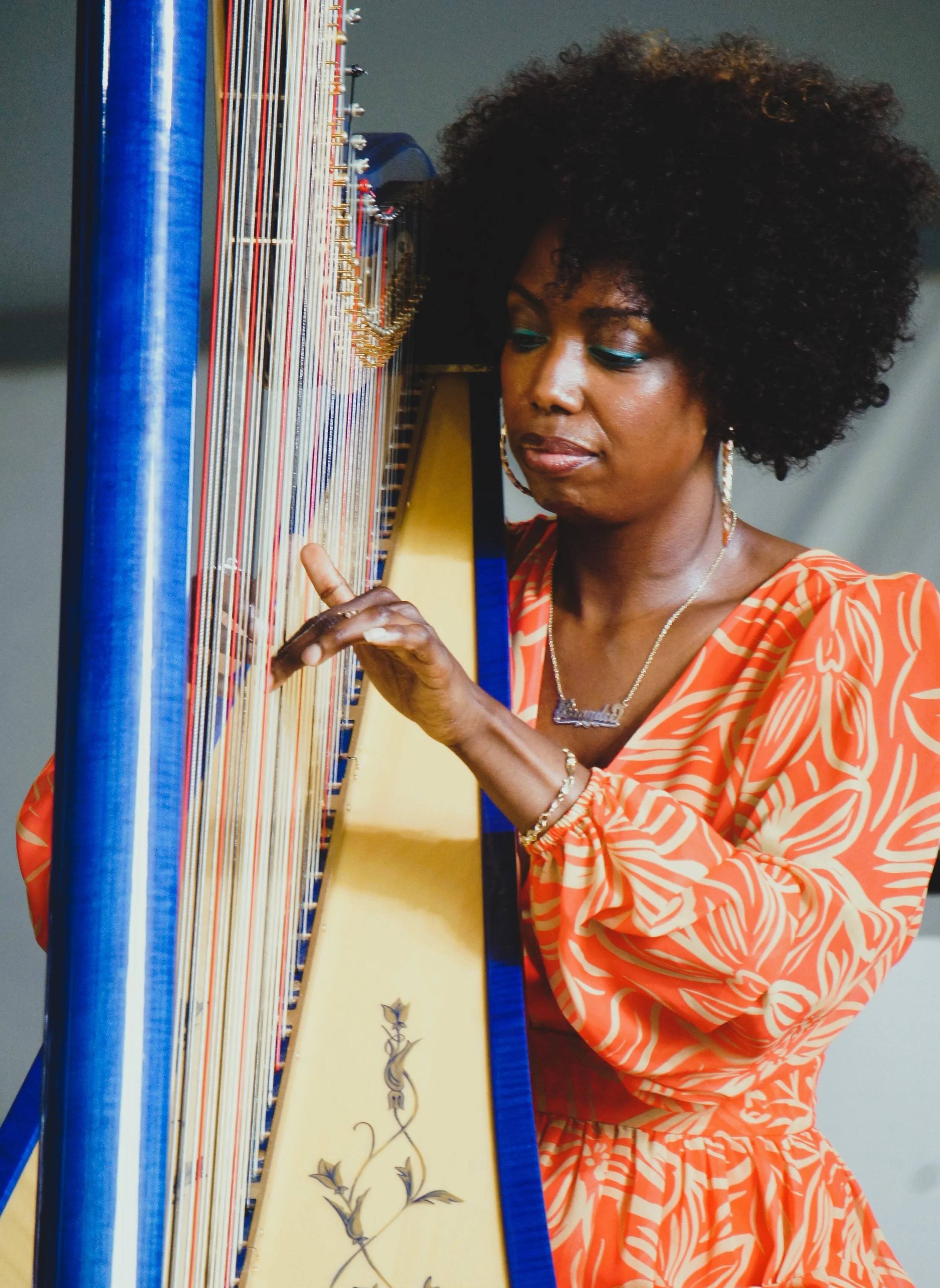 Brandee Younger performs at the 70th Annual Newport Jazz Festival (photo by Bridget Arnwine)