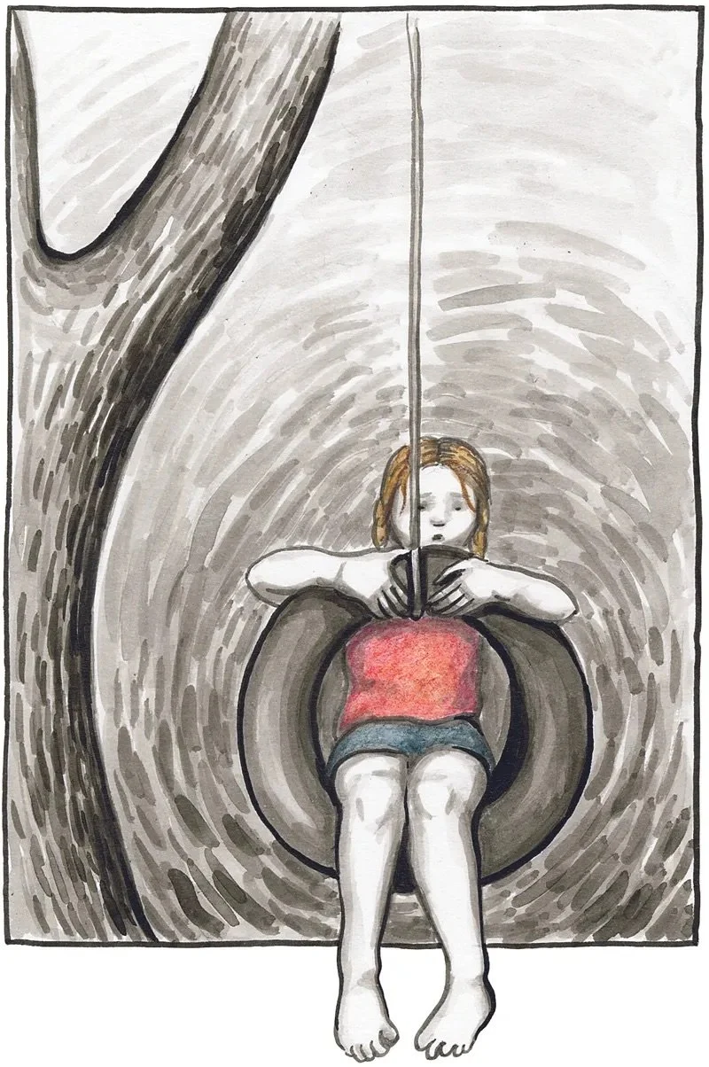 Girl on a tire swing