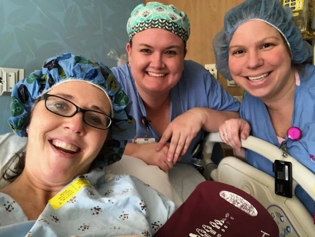 Post-birth celebration with nurses, Charlotte (right) and Julie (center)
