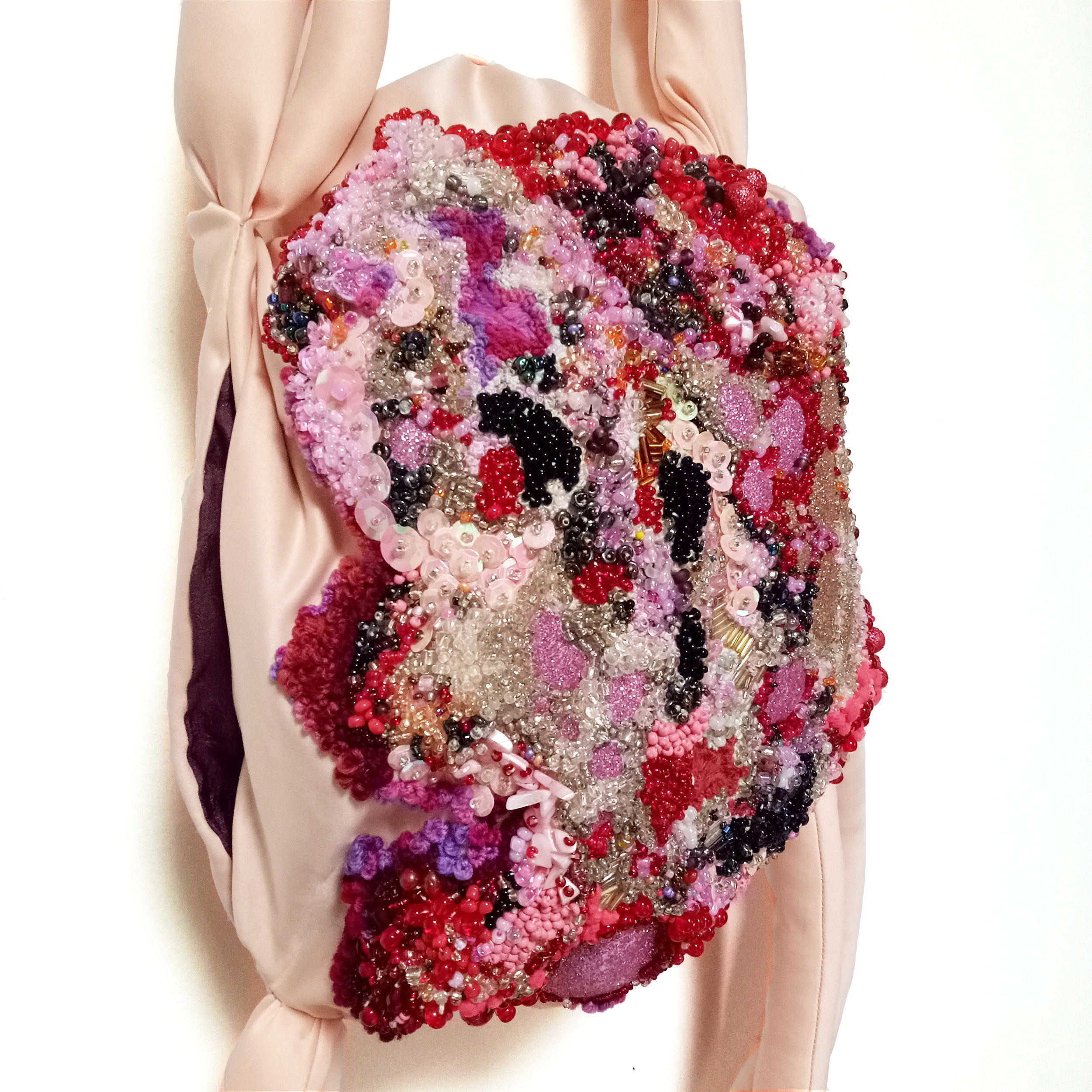   Flesh Sac (Back Pack)  2017   Embroidery of salvaged materials, (wool, polyester, glass, plastic, shell, wood, nylon, poly-fibre fill) Dimensions variable, approximately 95cm x 40cm x 22cm 