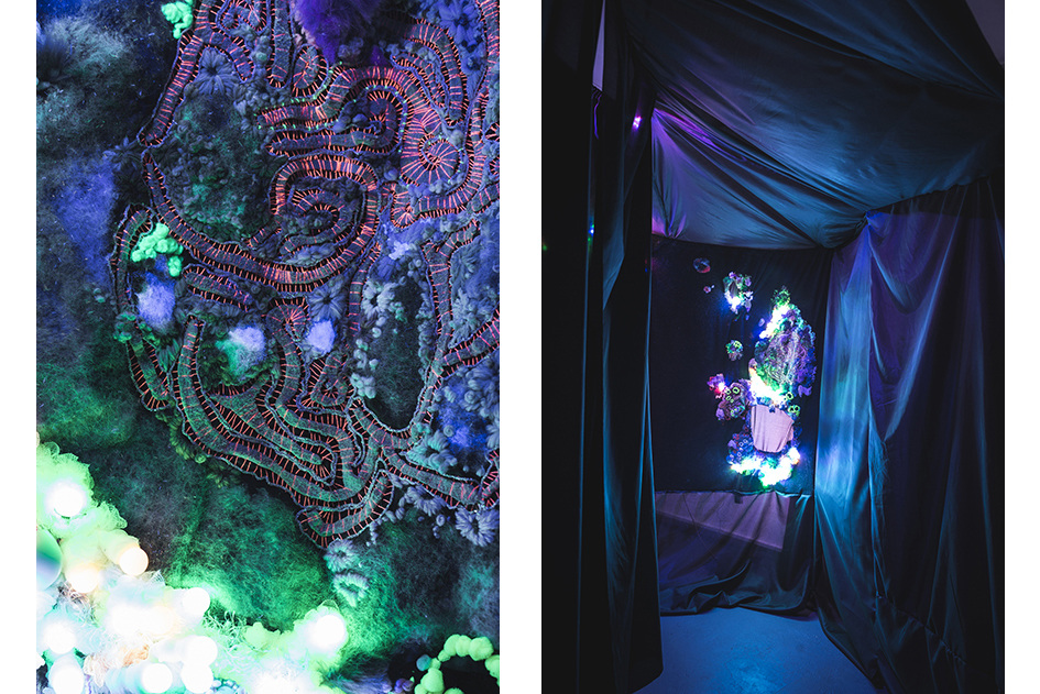   Louise Meuwissen x Lotte Schwerdtfeger     Intense Intents In Tents,  2014   Felt, cotton, wool, fur, faux-fur, plastic beads, glass beads, chiffon, synthetic lining, rope, ceramic with glaze, coloured LED, black light  Dimensions variable  Exhibit