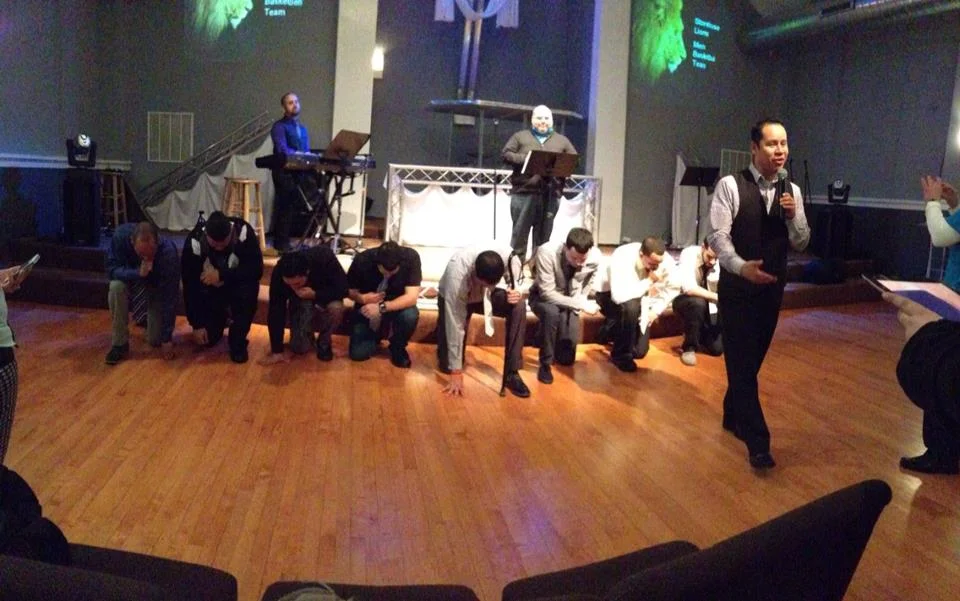 men praying.jpg