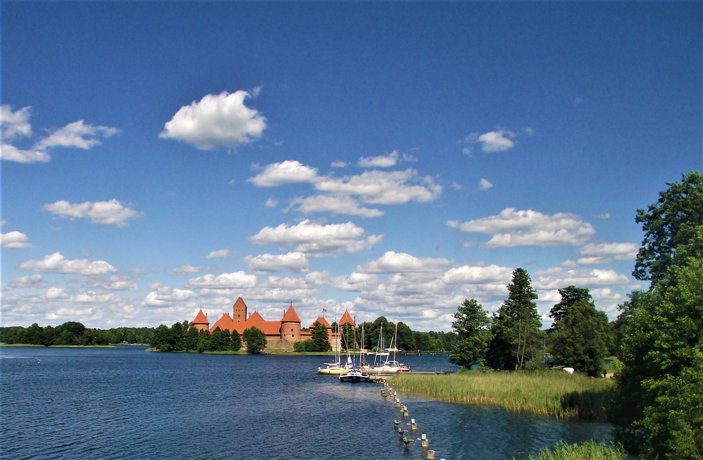 If you're looking for the best things to do in Lithuania Trakai Island Castle is one of the best places to visit on a road trip in the Baltics
