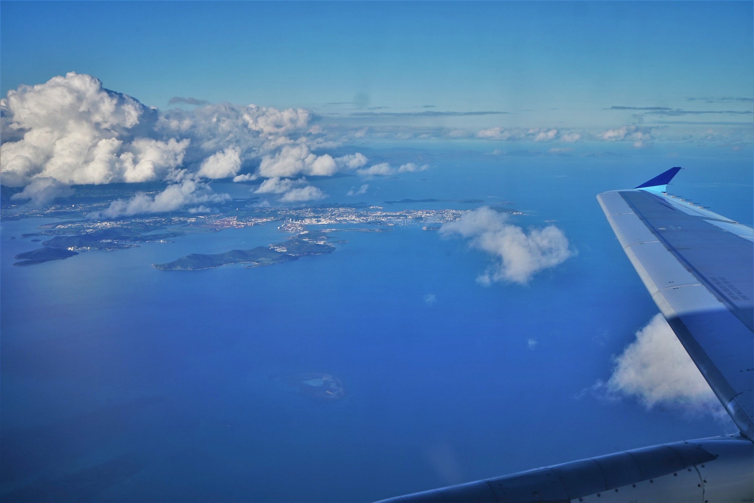 Beautiful views of New Caledonia from the plane. Flying to one of the smaller islands is a recommended New Caledonia travel tip.