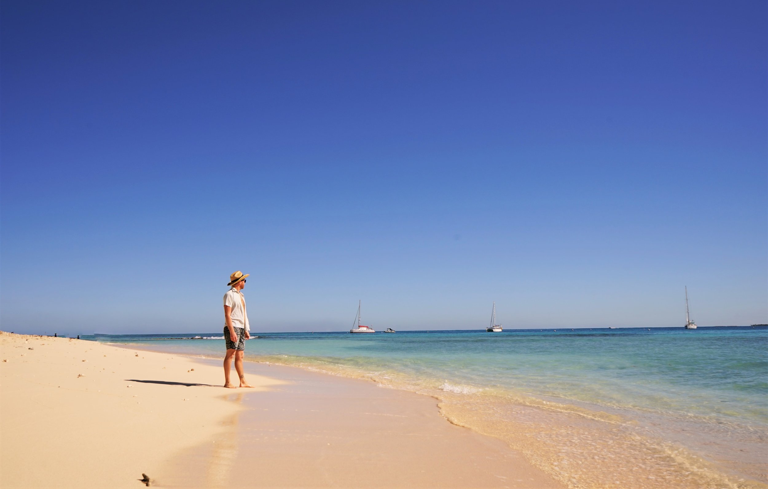 Relaxing on the beautiful sand beaches is one of the best things to do in New Caledonia.