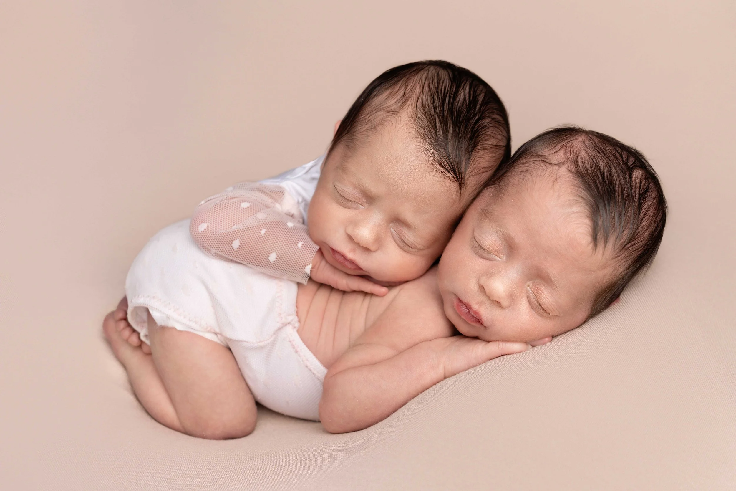 newborn twin babies during newborn photoshoot with lea cooper photography