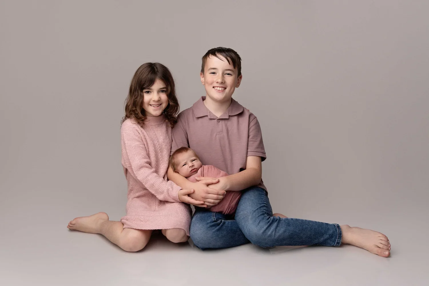 brother and sister with newborn baby Willenhall sibling newborn photography West Midlands