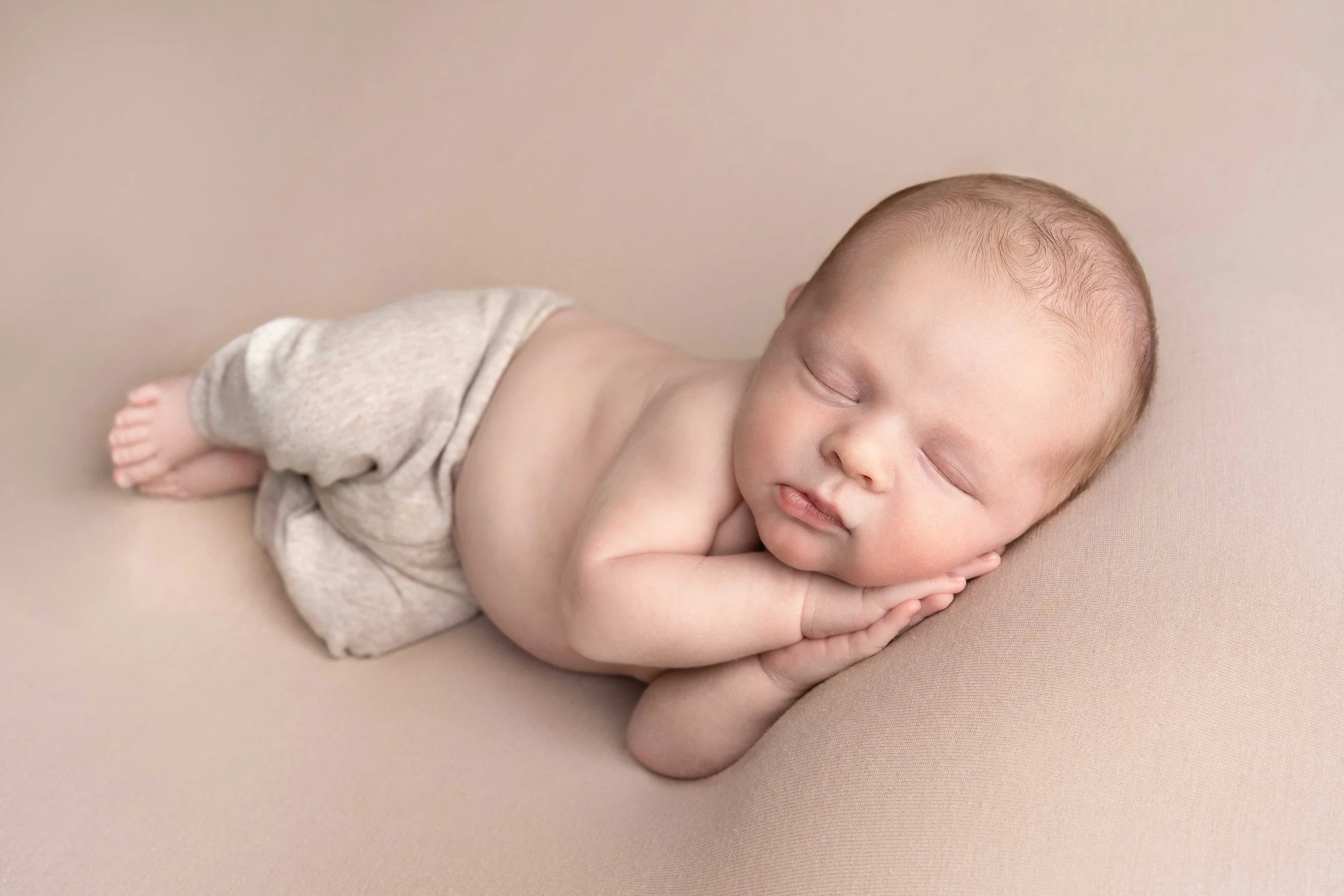 baby sleeping during baby photoshoot with newborn photographer lea cooper photography in wolverhampton west midlands uk