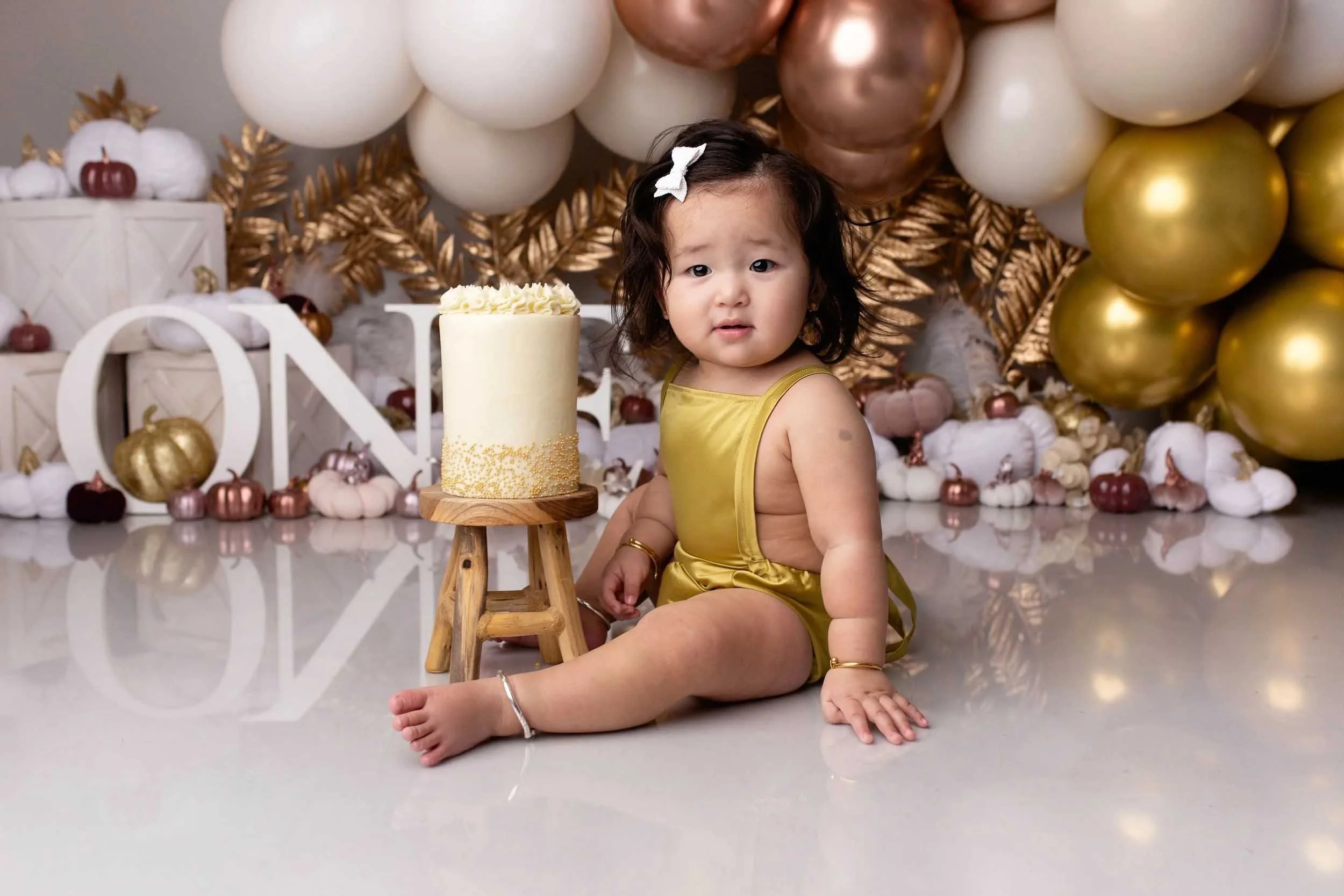 Studio cake smash photography session serving families in Wolverhampton