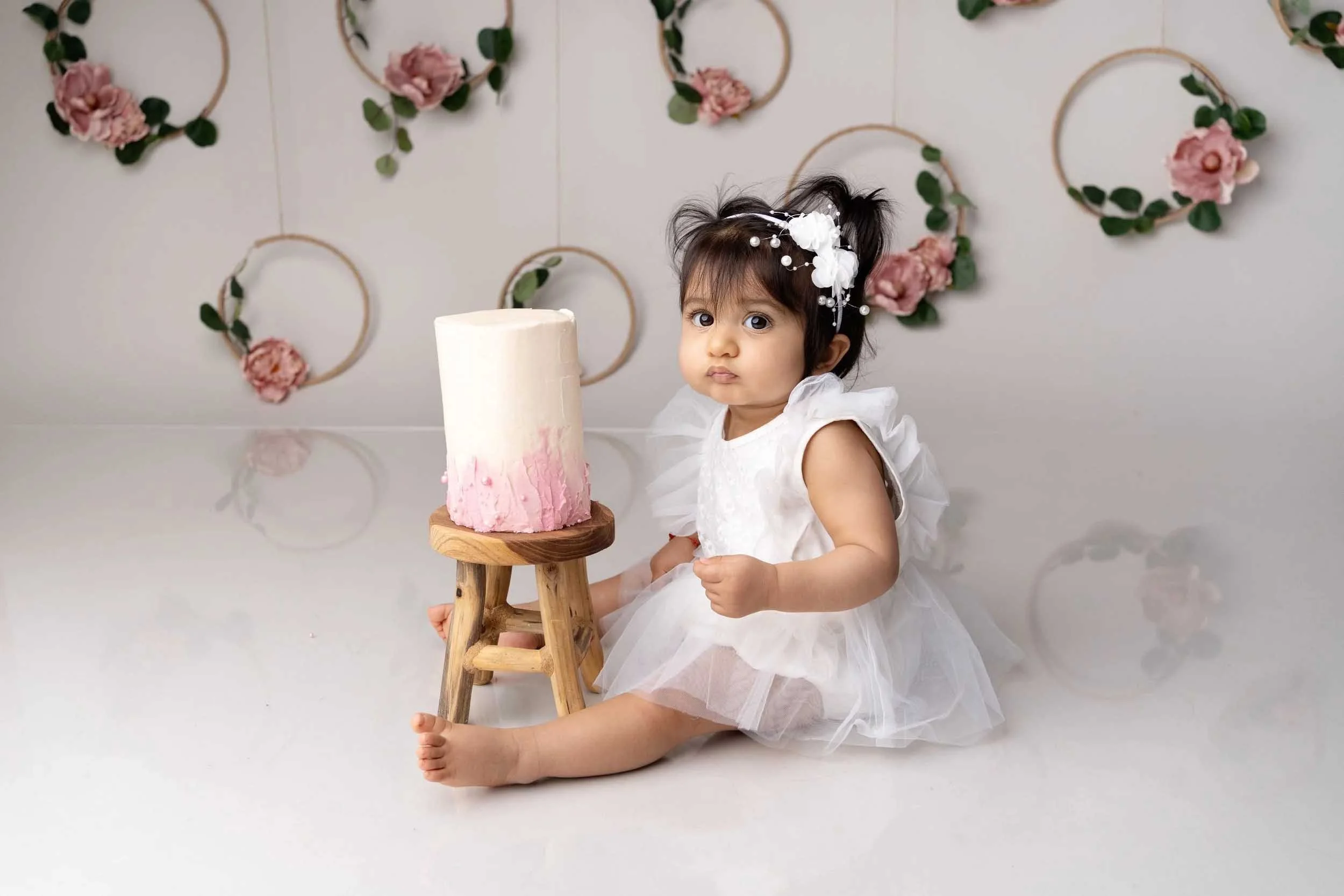 Studio cake smash photography session serving Birmingham parents