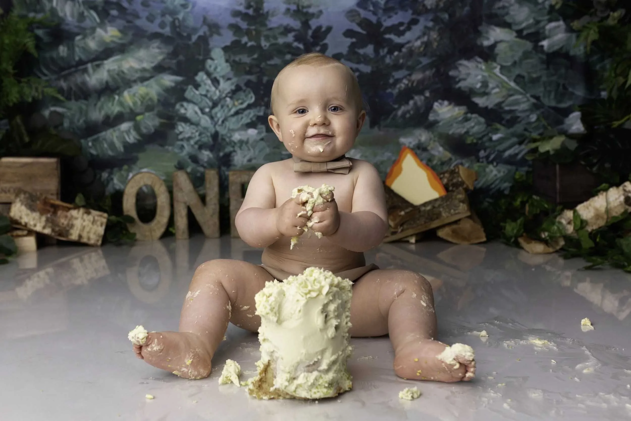 Baby cake smash photography session marking a first birthday in Willenhall