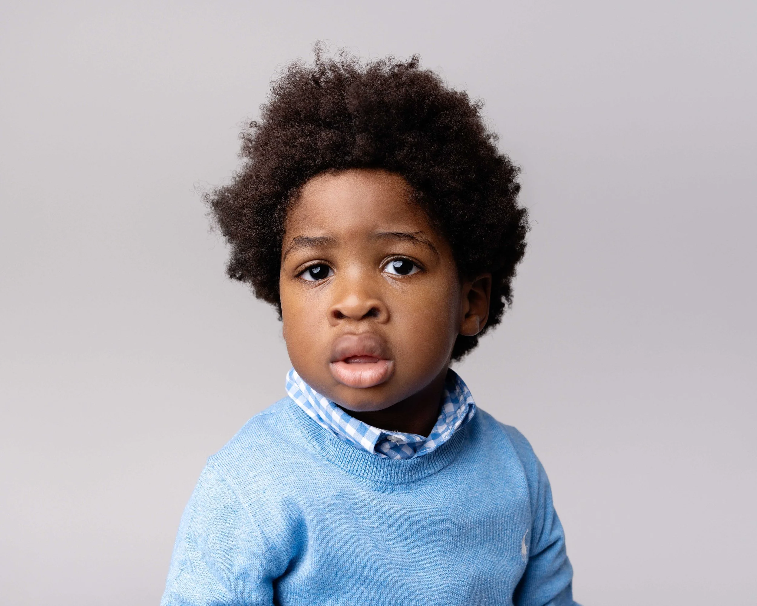 little boy during his photoshoot with lea cooper photography in wolverhampton in the west midlands - childrens photographer