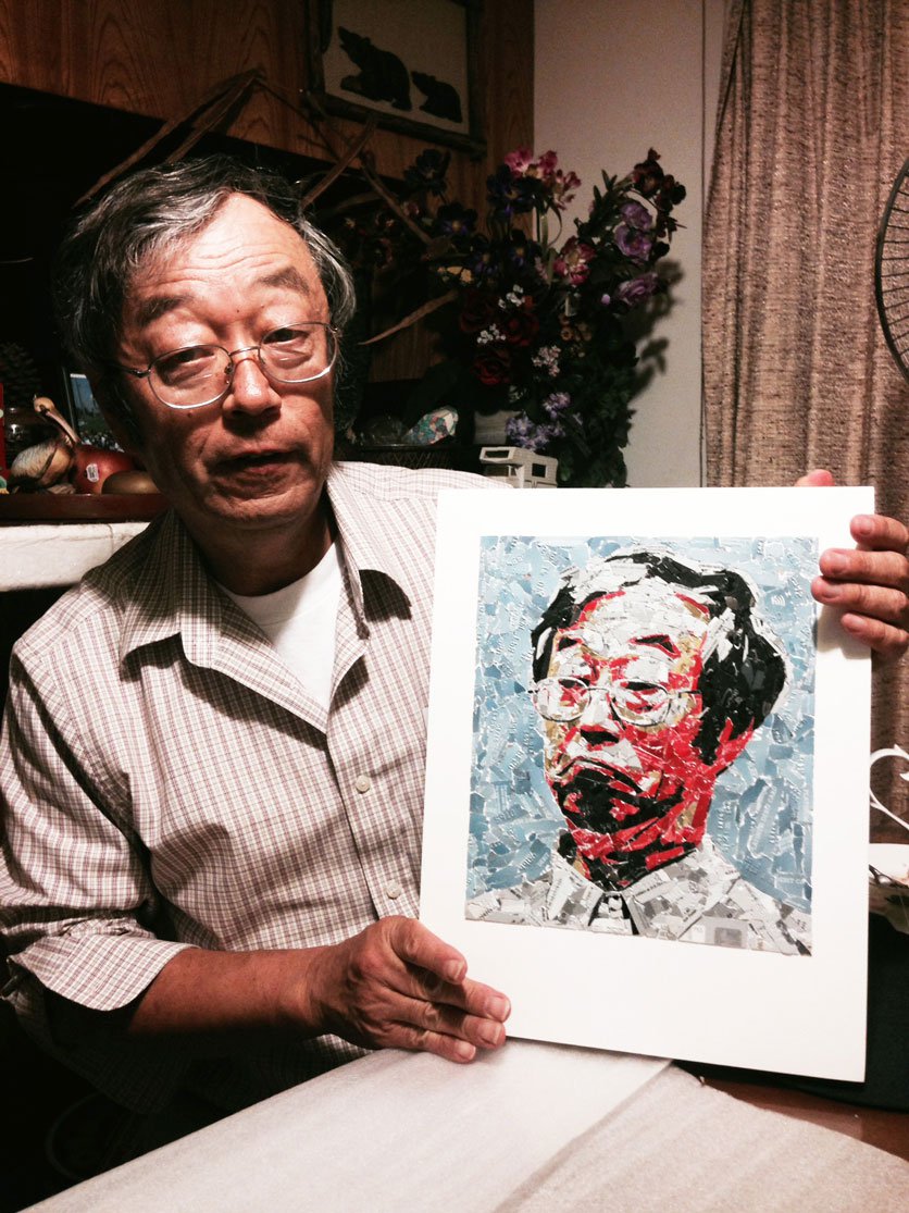 Dorian Nakamotot with his portrait by Cryptograffiti
