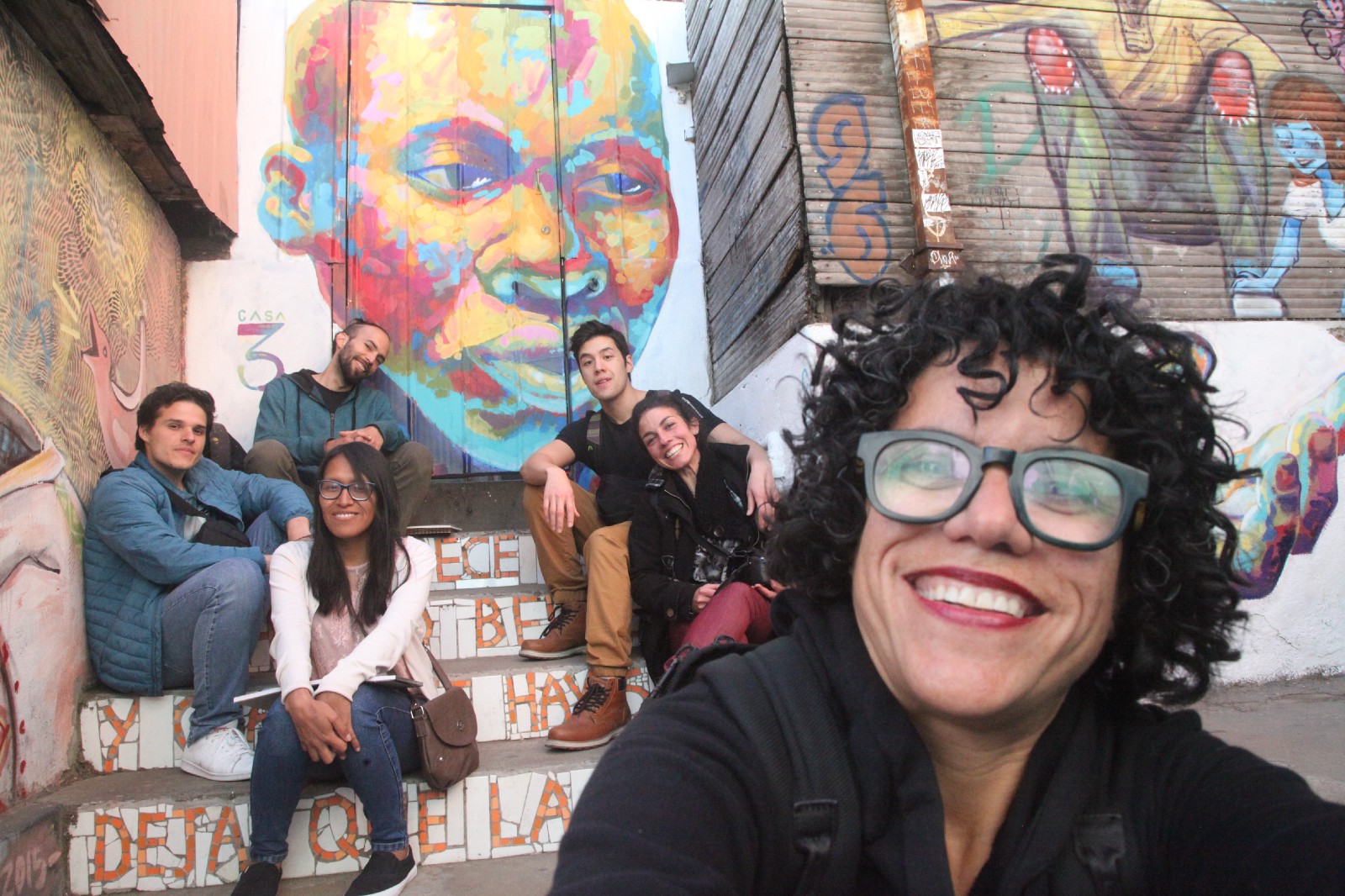 Bea Ramos (front right) regularly travels the world to engage directly with the artists in the Dada community. She knows their families, their personal challenges, and their failures and successes. I don't think you will see Zuckerberg traveling halfway around the world to show up at your door to cook a meal with you anytime soon.