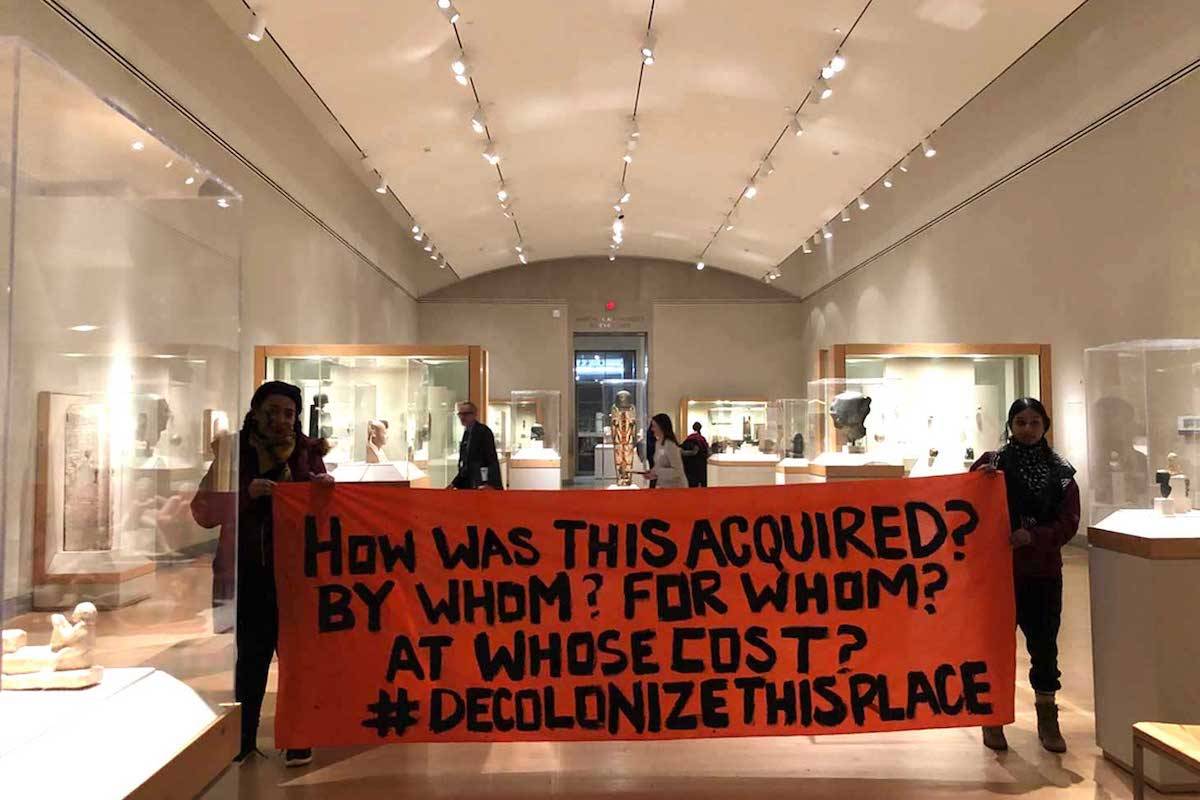 Decolonize this Place activists protesting in the Brooklyn Museum